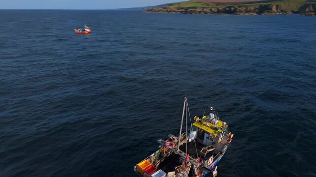 Boats fishing for mackerel off Eyemouth Scotland 