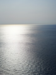 Tranquil seascape with distant mountain range seen from Zakynthos, Greece