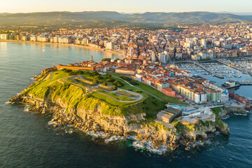 Aerial view of Gijon old town at sunrise, Asturias, Spain.