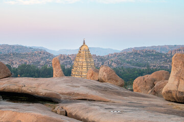 Virupaksha hinduism temple, boulder landscape in Hampi, Hemakuta Hill, South India, religious monument of ancient civilization, Vijayanagara Empire