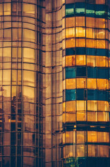 modern office building at sunset with reflection