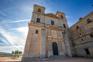 Fototapeta premium Facade of the Renaissance church of the monastery of Uclés, Cuenca, Castilla-La Mancha, Spain, backlit