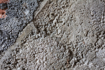 High-resolution Texture of Rough Gray Concrete Surface with Visible Grain, Cracks, and Rugged Details. Perfect for Architectural Backgrounds, Construction Themes, and Industrial Design Elements.