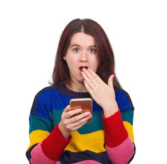 Shoked young woman using her phone looks amazed with open mouth emotion. Stunned female reaction isolated on transparent background