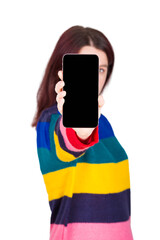 Young woman with outstretched hand showing smartphone blank display to camera, isolated on transparent background