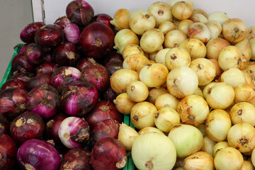 red and white onions at a neighborhood market
