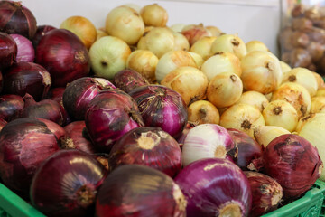 red and white onions at a neighborhood market