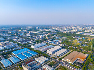 Aerial view of urban scenery in the suburbs, neatly planned factory parks, Qingpu central district, Shanghai.