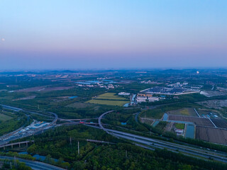 Aerial view of urban scenery in the suburbs at sunset, Shanghai.