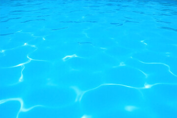 Obraz premium blue swimming pool with ripples in the water