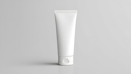 A pristine white tube of cosmetic cream stands isolated on white background, ready for branding