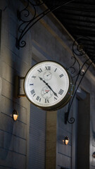 Vintage Wall Clock with Roman Numerals Showing 10:23