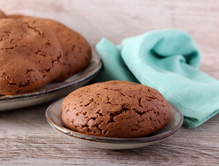 Soft chocolate cookies on plate, served