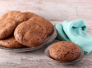 Soft chocolate cookies on plate, served