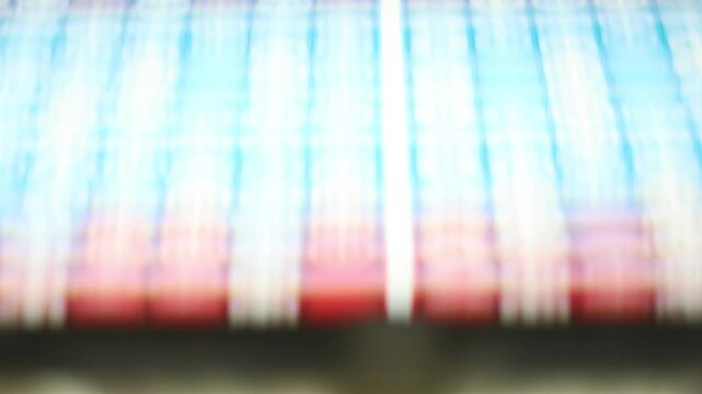 printing of colored and numbered game cards called bingo in the printing house. selective focus