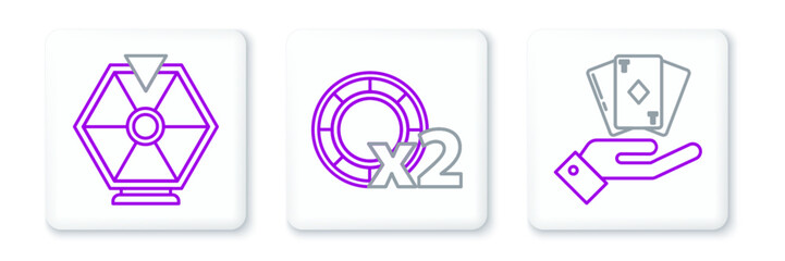 Set line Hand holding deck of playing cards, Lucky wheel and Casino chips icon. Vector