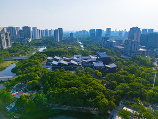 Aerial view of skyscrapers with beautiful lake garden on sunny day, Jiading central district,...