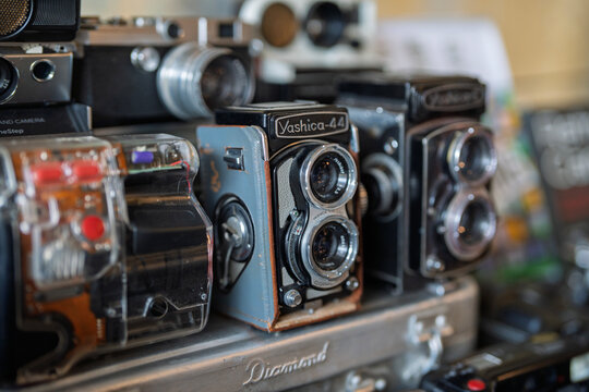 Penang, Malaysia &ndash; June 1, 2025: A close-up view of classic twin-lens reflex (TLR) cameras, with the iconic Yashica-44 prominently displayed among other vintage models.
