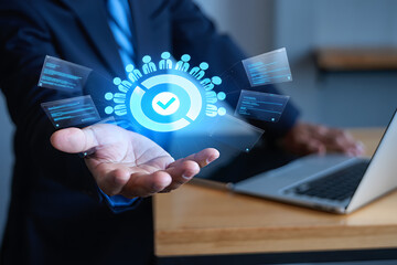 Business professional holding glowing technology representing team approval and concept