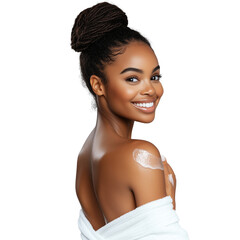 A beautiful woman, with her hair in an updo, is smiling and applying body lotion to the skin on the side of one arm, with a white towel wrapped around her shoulders, on a transparent background