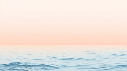 Obraz premium Gentle ocean waves against a pastel sky.