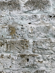 Textured white wall with visible wear and age marks