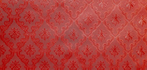 Luxuri&ouml;se rote Tapete mit Barockmuster als Vollbild und Hintergrund mit Platz f&uuml;r Text