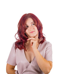 Pensive readhead woman holding hand under chin thoughtful looking away. Dreaming of success