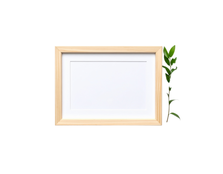 Simple wooden frame with white matte and a sprig of green leaves