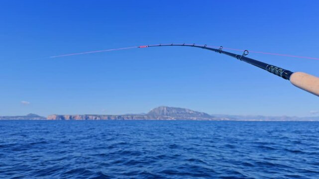 boat trolling on the ocean sea, Rod Sport fishing