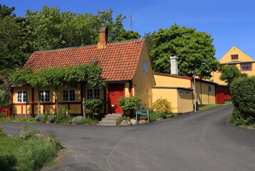 Denmark, Bornholm Island, Gudhjem. Typical colorful street.