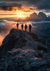 Fototapeta premium A group of five hikers stand atop a rugged mountain ridge during a breathtaking sunset, surrounded by vibrant clouds and distant peaks, capturing the spirit of adventure and nature.