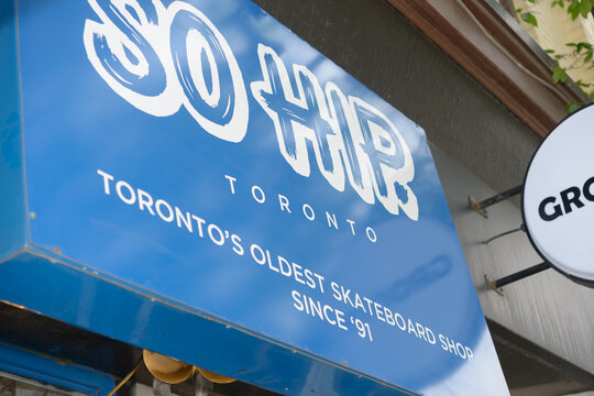 exterior storefront sign outside So Hip located at 323 Queen St W, Toronto