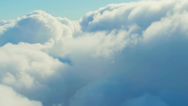 Breathtaking view of white fluffy clouds from above, floating through a vast blue sky, beautiful natural skycape footage. Cloud Dancer - Color of the year 2026	