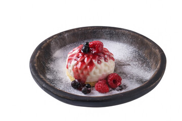 Italian Panakota dessert with berries isolated on white background