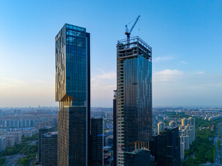 Aerial view of Shanghai skyscrapers in the suburbs at sunset, Yangpu central district, Shanghai.