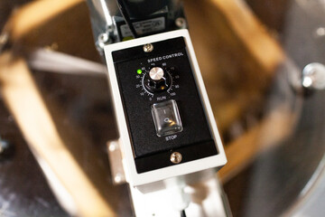 Switch and speed dial on honey harvest extractor machine