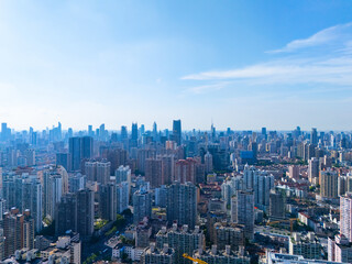 Aerial view of Shanghai skyscraper in downtown with blue sky background.