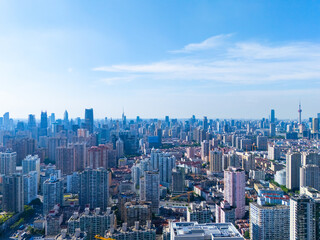 Aerial view of Shanghai skyscraper in downtown with blue sky background.