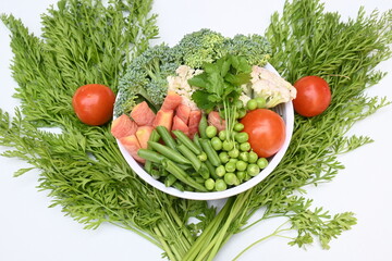 Vibrant medley of fresh vegetables. Features broccoli, cauliflower, tomatoes, Carrot, green beans, and peas. colourful vegetables of spring time, Its good for health. colorful display.