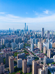 Aerial view of Shanghai skyscraper in downtown with blue sky background.