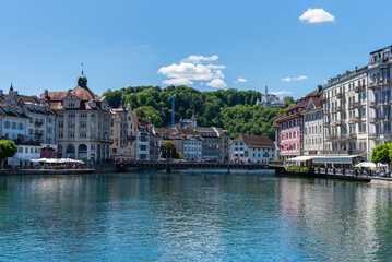 Lake Lucerne Harbor and Chapel Bridge Amid Historic Architecture