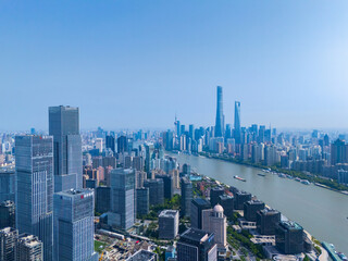 Aerial view of Shanghai skyscraper in downtown with blue sky background.
