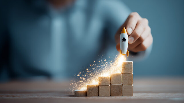 Conceptual Growth Symbolized by Rocket and Building Blocks