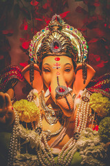 Vibrant Lord Ganesha Idol: Adorned for Festive Celebrations and Spiritual Worship