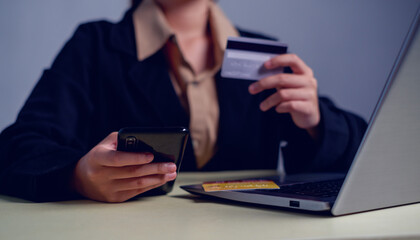 online shopping concept. hands holding credit card and using smart phone. shopping online payment by using smart phone.