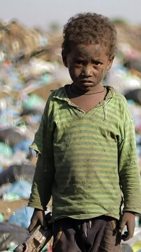 A portrait of a child affected by poverty and living in unsanitary conditions