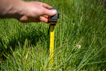 Measuring Lush Green Pasture on an Australian Farm. Symbolizing Data Driven Decisions and...