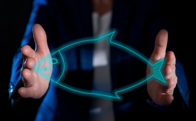 Hands display holographic fish in dark environment during technology demonstration
