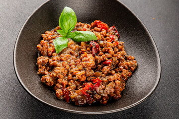 Lentil dish vegetables and roasted peppers savory vegetable fresh vegetarian and vegan food gourmet food background on the table rustic food top view copy space keto and paleo diet
